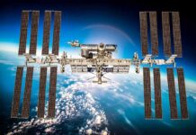 Space Umbrella Saves Doomed Station International Space Station with large solar arrays over Earth