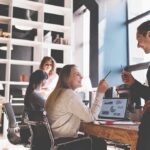 Canadian Taxpayers Funded Nearly 70% of This Advocacy Group’s Budget Coworkers collaborating at a desk in a modern office