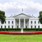 The Mission With No Time to Waste The White House with fountain and red flower bed