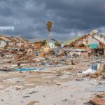 storm-damaged coastal neighborhood with demolished houses