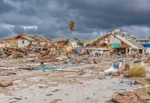 storm-damaged coastal neighborhood with demolished houses