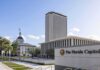 One State’s COVID Gamble Changed the National Debate Florida Capitol complex with modern tower and historic dome