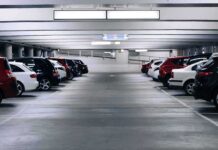 Clean-Car Rules Raise Cost Concerns Row of parked cars in an indoor parking garage