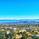 Suburban neighborhood with mountains in the distance