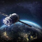 A Daring Space Grab Could Save NASA’s Aging Telescope Satellite orbiting Earth over night side