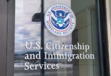 Wounded Driver Remains in Federal Custody Door with U.S. government seal and office lettering