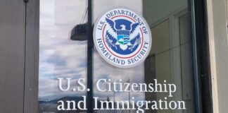 Door with U.S. government seal and office lettering