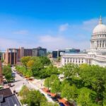 West Virginia Ties Data Center Revenue Capitol building with dome overlooking a city park
