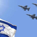 Israeli flag with three fighter jets flying overhead