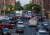 Queens Street Fight Turns Deadly Police vehicles and officers block a city street during an active scene