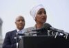 Omar Pushes $140B ICE Funding Shift Ilhan Omar speaking at a podium with André Carson standing behind
