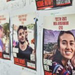 Posters of missing people on a wall