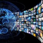 Feminist Icon Dies: Marking End of an Era Digital globe with curved wall of multimedia screens