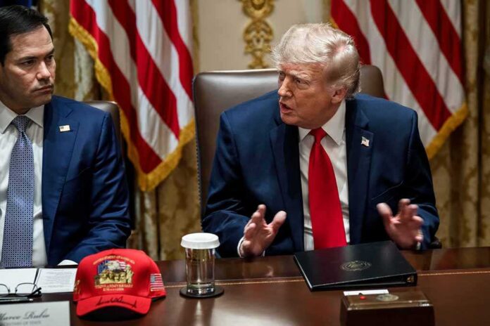 President,Donald,J.,Trump,Holds,A,Cabinet,Meeting,In,The Man in suit with red tie speaks at meeting table