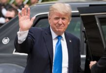 Trump and Xi Plan Two More Summits Donald Trump waves while standing beside a black vehicle