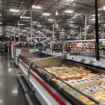 Caught On Camera: Ceiling Drops, Chaos Follows Supermarket dairy aisle with refrigerated cheese display cases