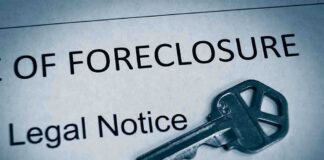 A key placed on a foreclosure notice document