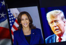 Michigan Debate Turns Heated Kamala Harris and Donald Trump shown on adjacent screens with a U.S. flag nearby