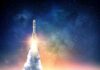 Rocket launching into starry night sky