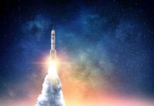 Rocket launching into starry night sky