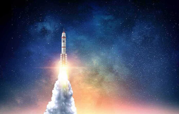 Rocket launching into starry night sky