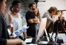 Former Fox Insider Shares Controversial Account Photography team working in a studio