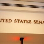 Republican Senator Publishes Profane Texts to Trump Sign displaying United States Senate in a government building