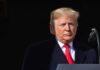 Trump Speech Disrupted by Heated Protest Donald Trump at a podium with a microphone
