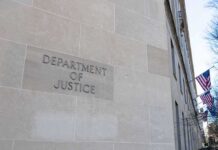 Political Fallout Grows Over Court Filing Department of Justice building exterior with American flags