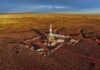 Oil drilling rig at remote desert site