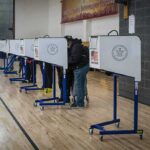 20,000 Ballots at Center of Election Dispute Voters at polling booths in a gymnasium