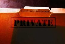 file folders labeled for patient health records marked private