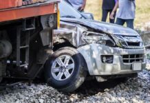 Two Kids Inside SUV That Went Over Cliff silver SUV collided with a train at a railway crossing